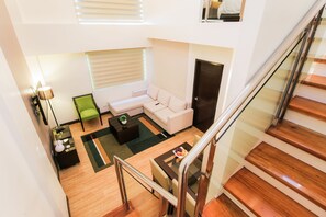 Loft, 2 Bedrooms | Living area | 32-inch flat-screen TV with cable channels, TV - Prime City Resort Hotel (Angeles City)