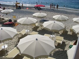 Playa privada en los alrededores, sillas reclinables de playa