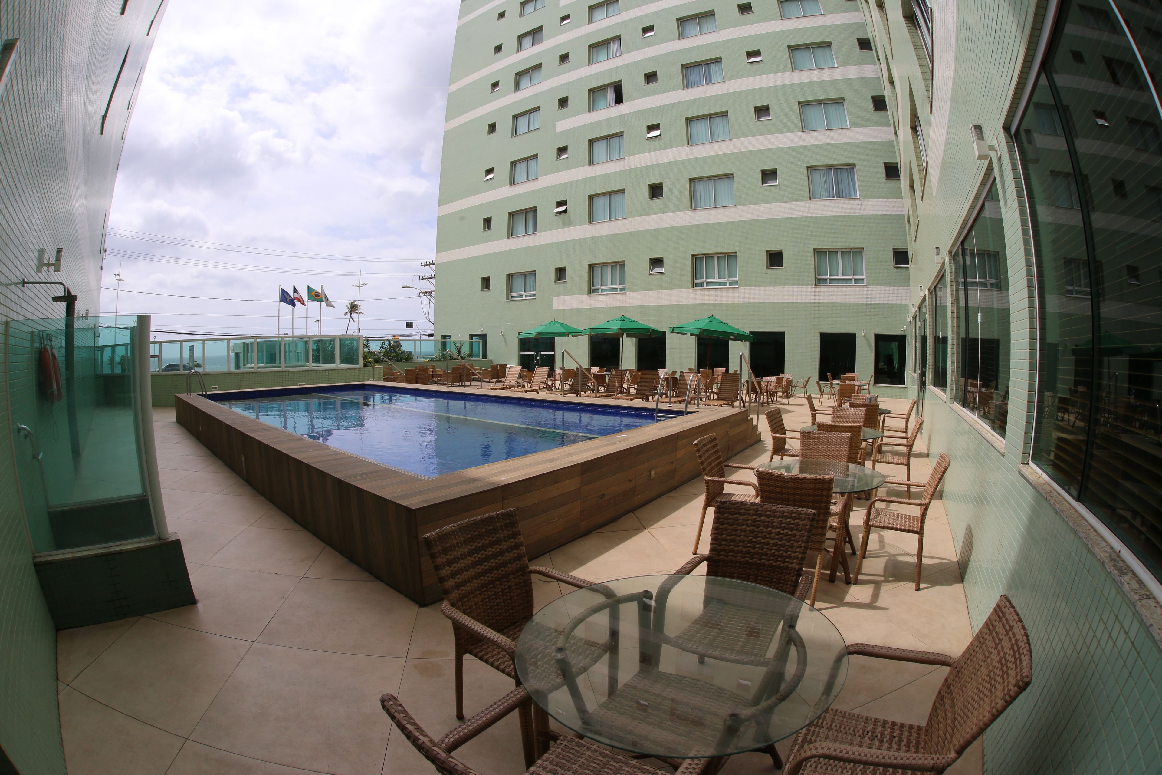 outdoor pool, open 10:00 am to 8:00 pm, pool umbrellas, pool loungers