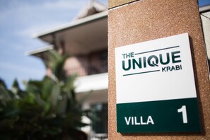 A sign for "The Unique Krabi" indicating "Villa 1". - The Unique Krabi Private Pool Villa (Krabi)
