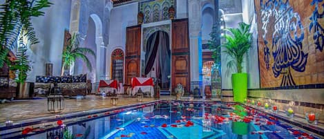 Indoor pool, outdoor pool, pool umbrellas, pool loungers