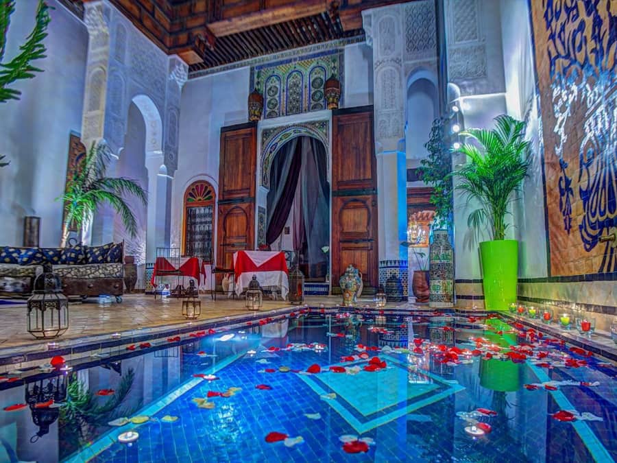 Indoor pool, outdoor pool, pool umbrellas, pool loungers