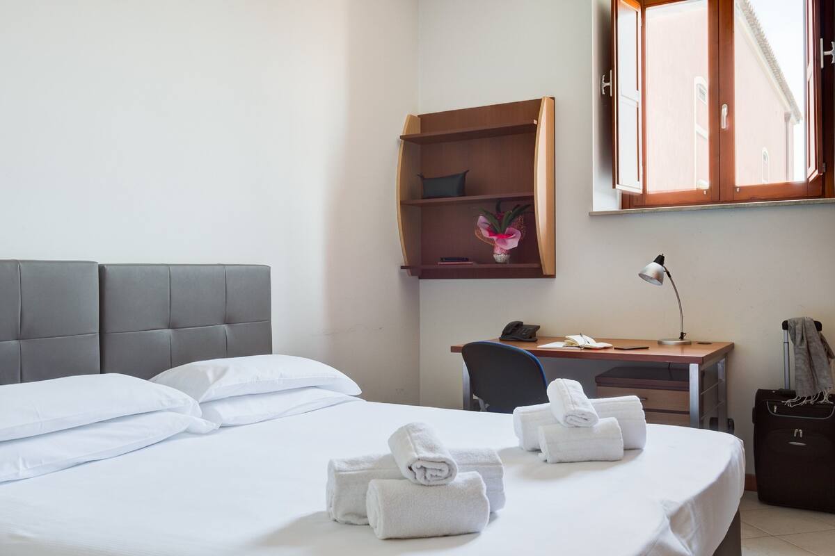Desk, WiFi (free), bed sheets