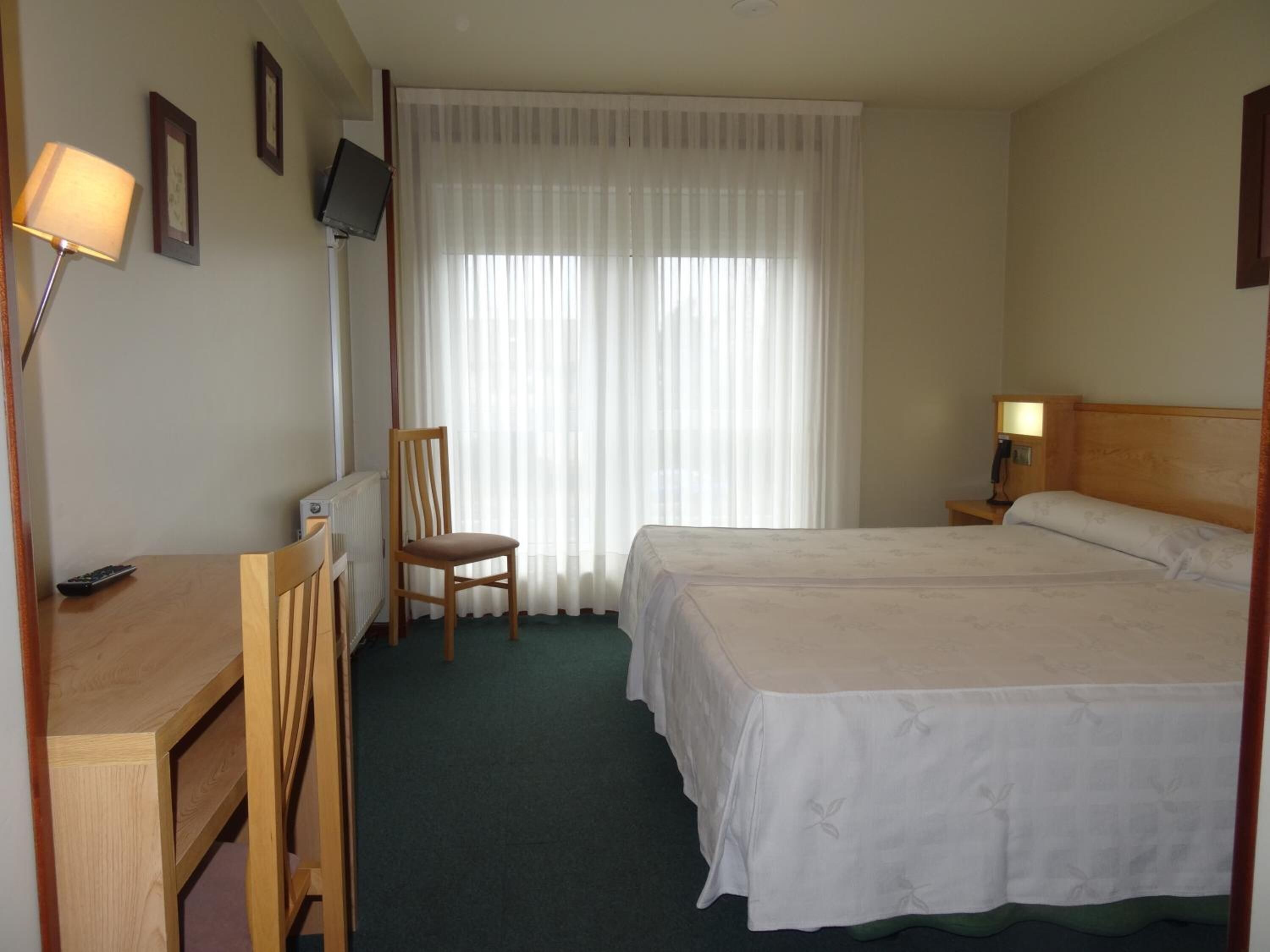 premium bedding, down duvets, desk, laptop workspace