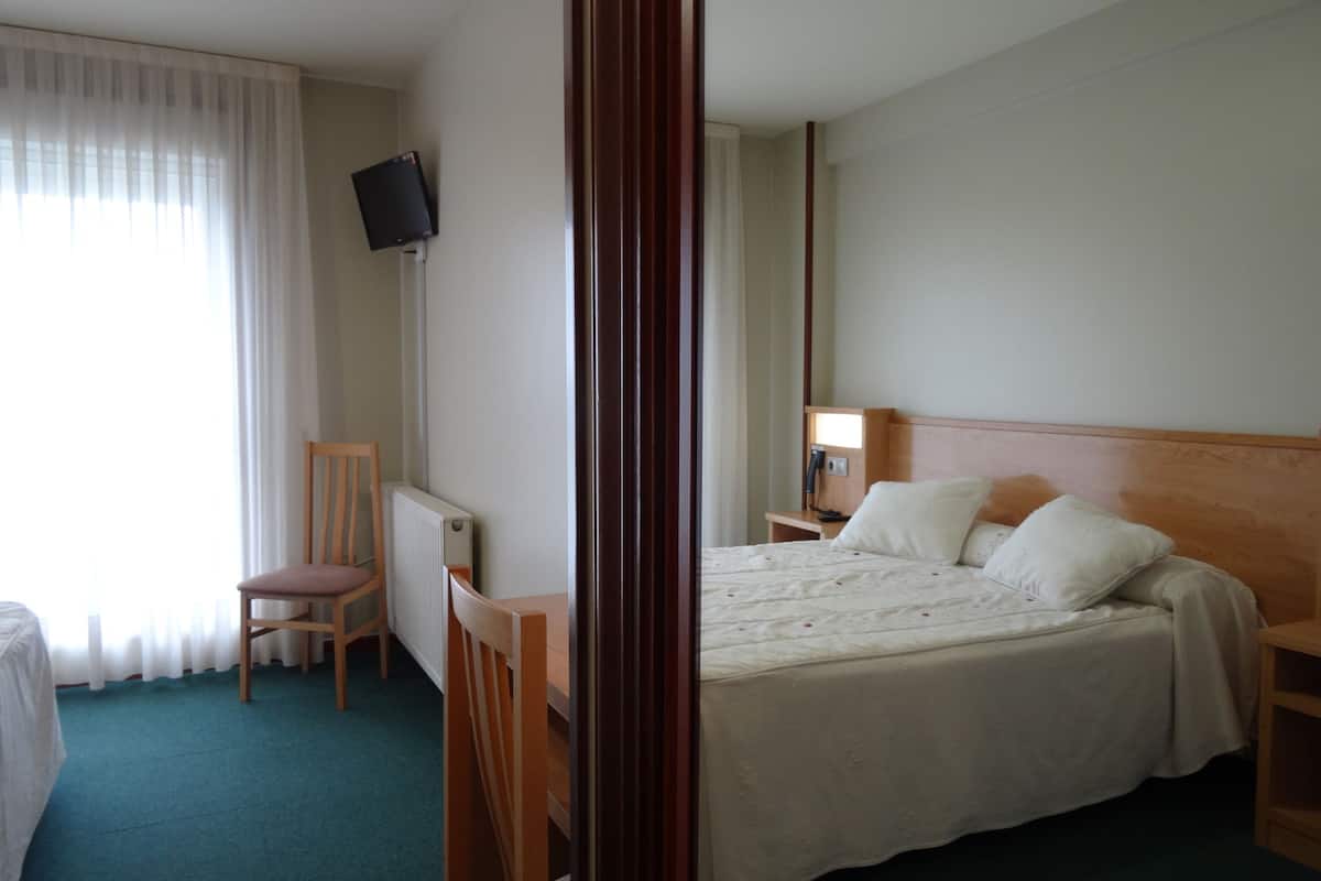 premium bedding, down duvets, desk, laptop workspace