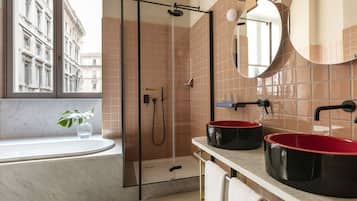Junior Suite | Bathroom | Rainfall showerhead, designer toiletries, hair dryer, bidet
