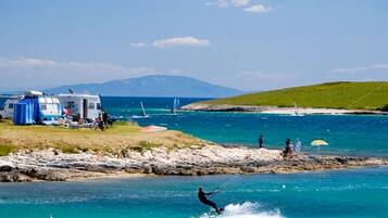 On the beach, snorkelling, windsurfing, kayaking