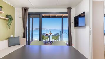Camping Home first row to the Sea | Living area | TV