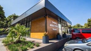 A modern building with a reception area labeled "Camping Arena Stupice." - Arena Stupice Camping Homes (Medulin)