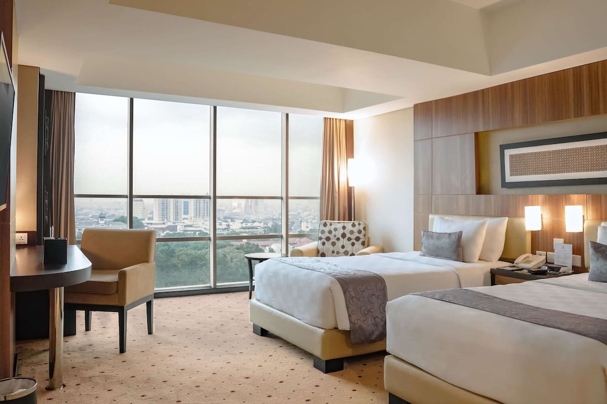 deluxe room, 2 single beds, non smoking, city view (shower only) | in-room safe, individually furnished, desk, laptop workspace