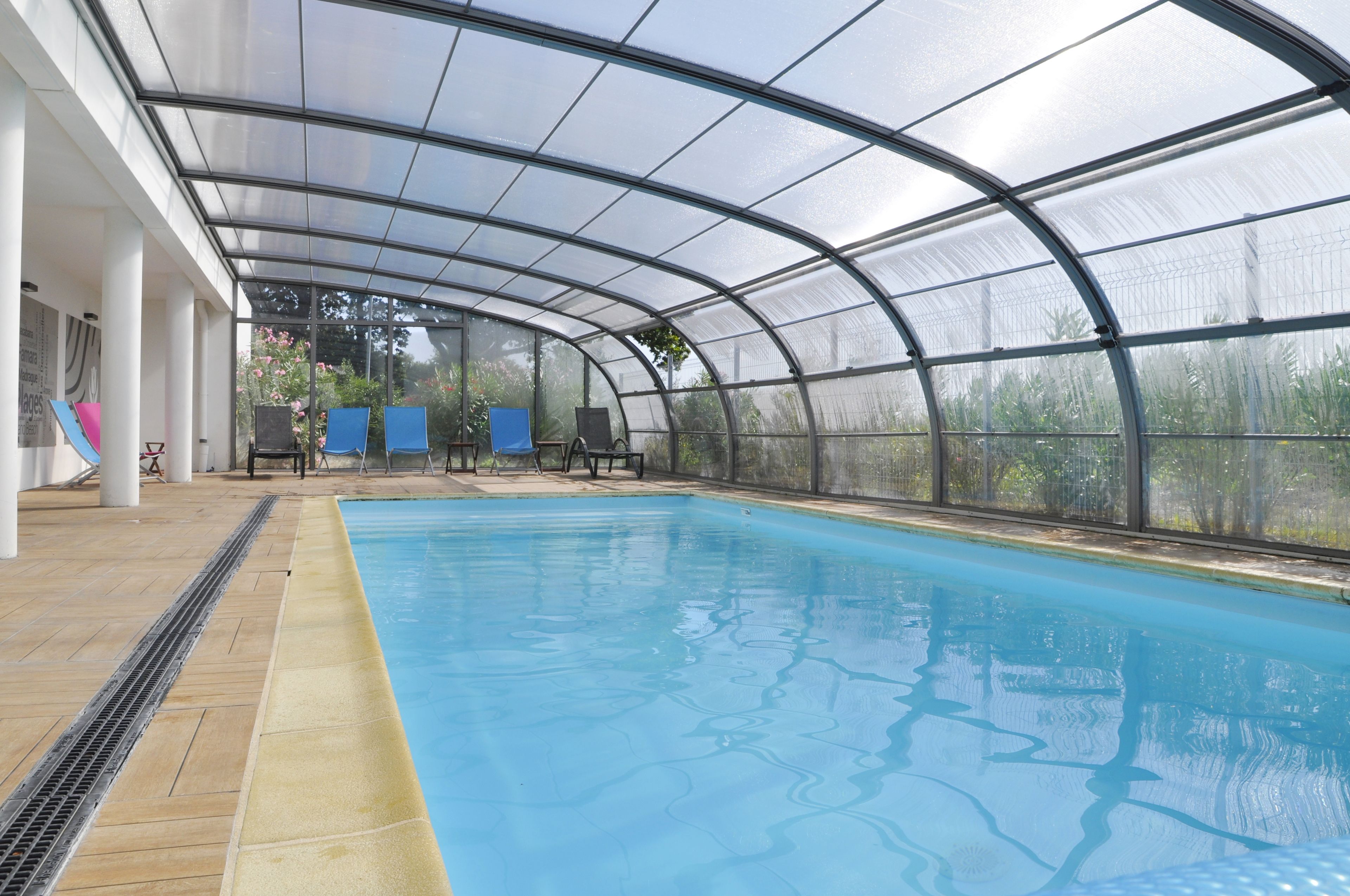 indoor pool, open 8:00 am to 10:00 pm, pool loungers