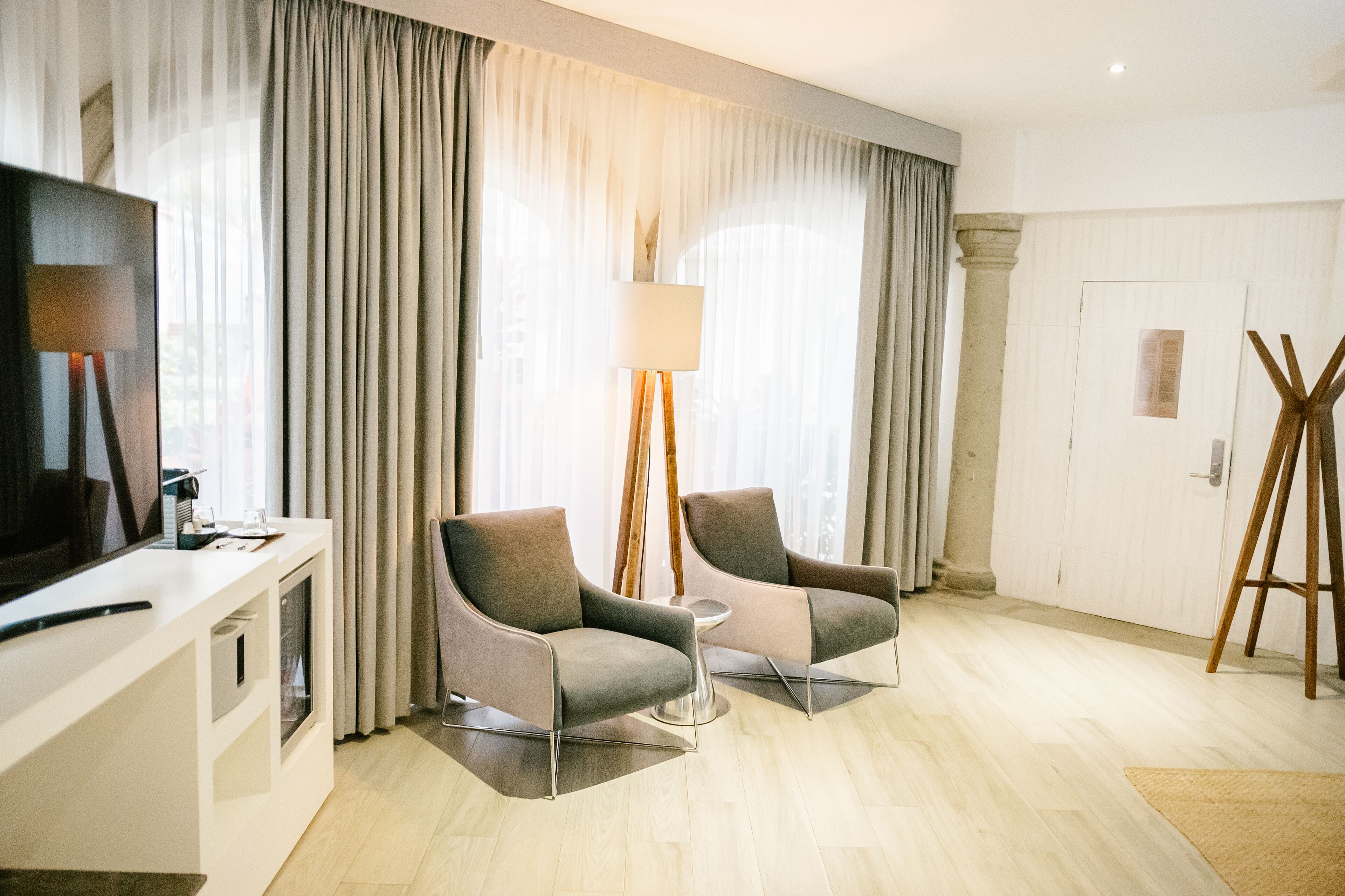 deluxe room - plata 999 | living area | 70-inch smart tv with satellite channels, tv, ipad