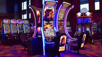 A casino with slot machines and gaming tables.