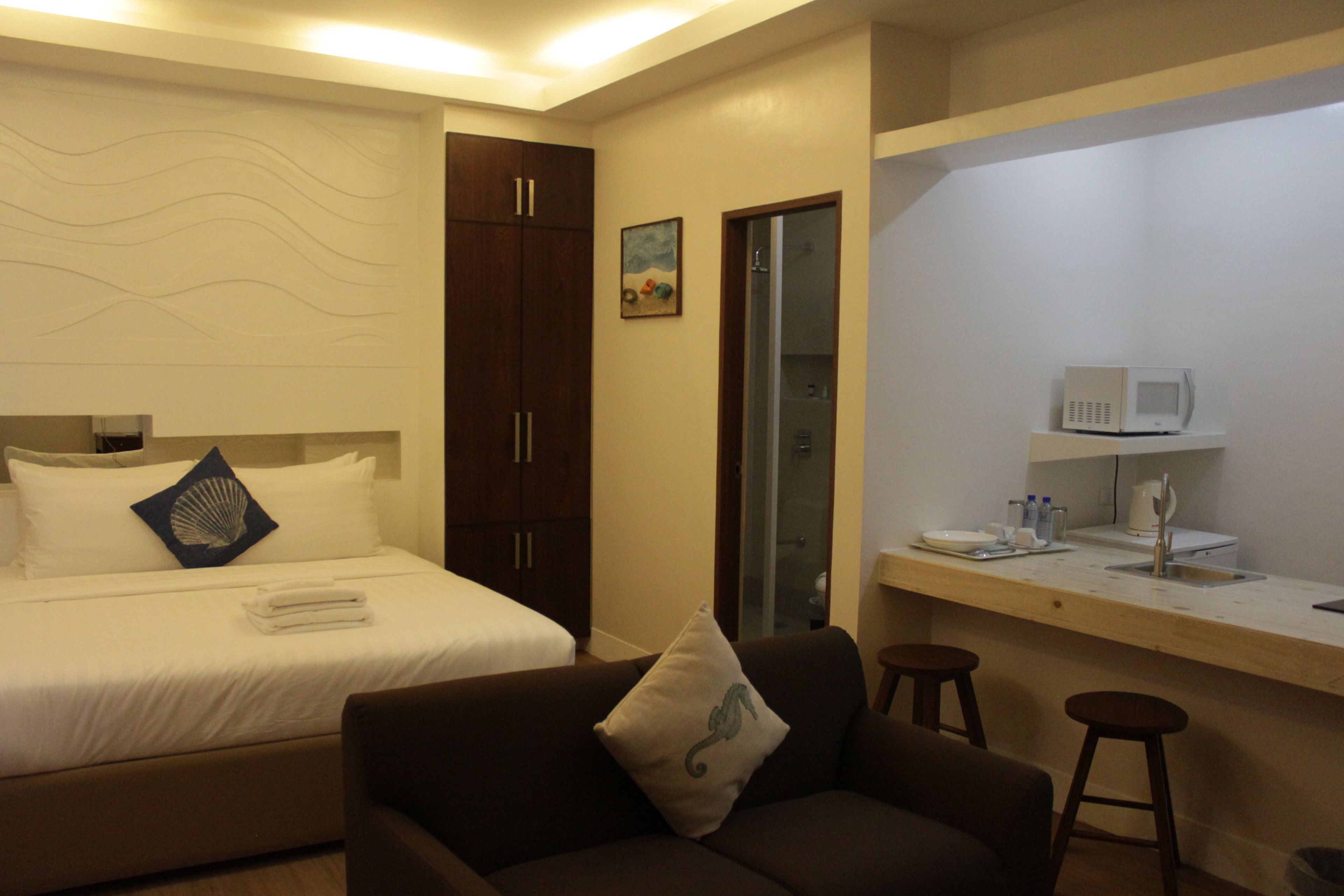 Suíte executiva | Cofres nos quartos, escrivaninha, Wi-Fi de cortesia, roupa de cama