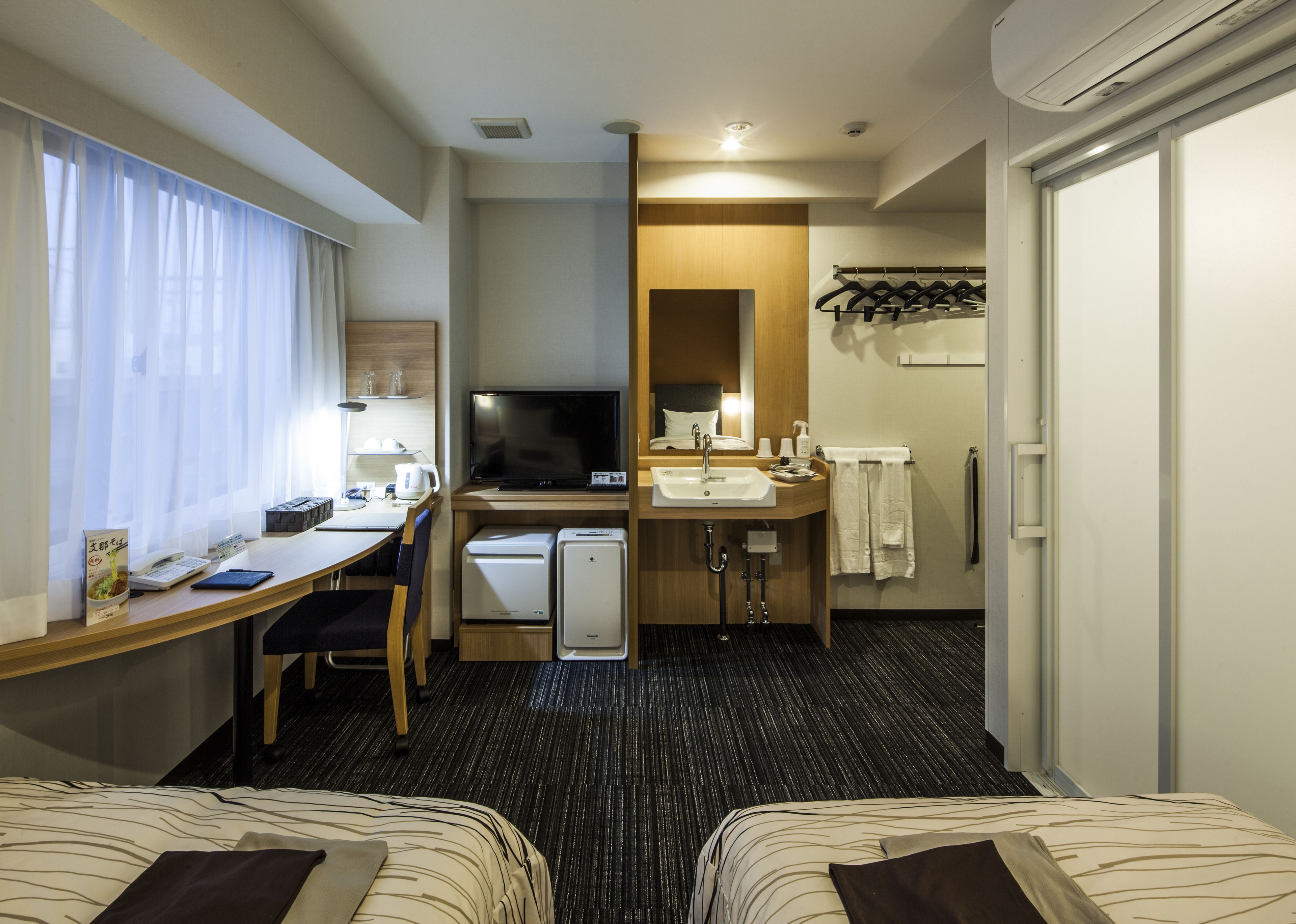 premium bedding, desk, blackout curtains, free wifi