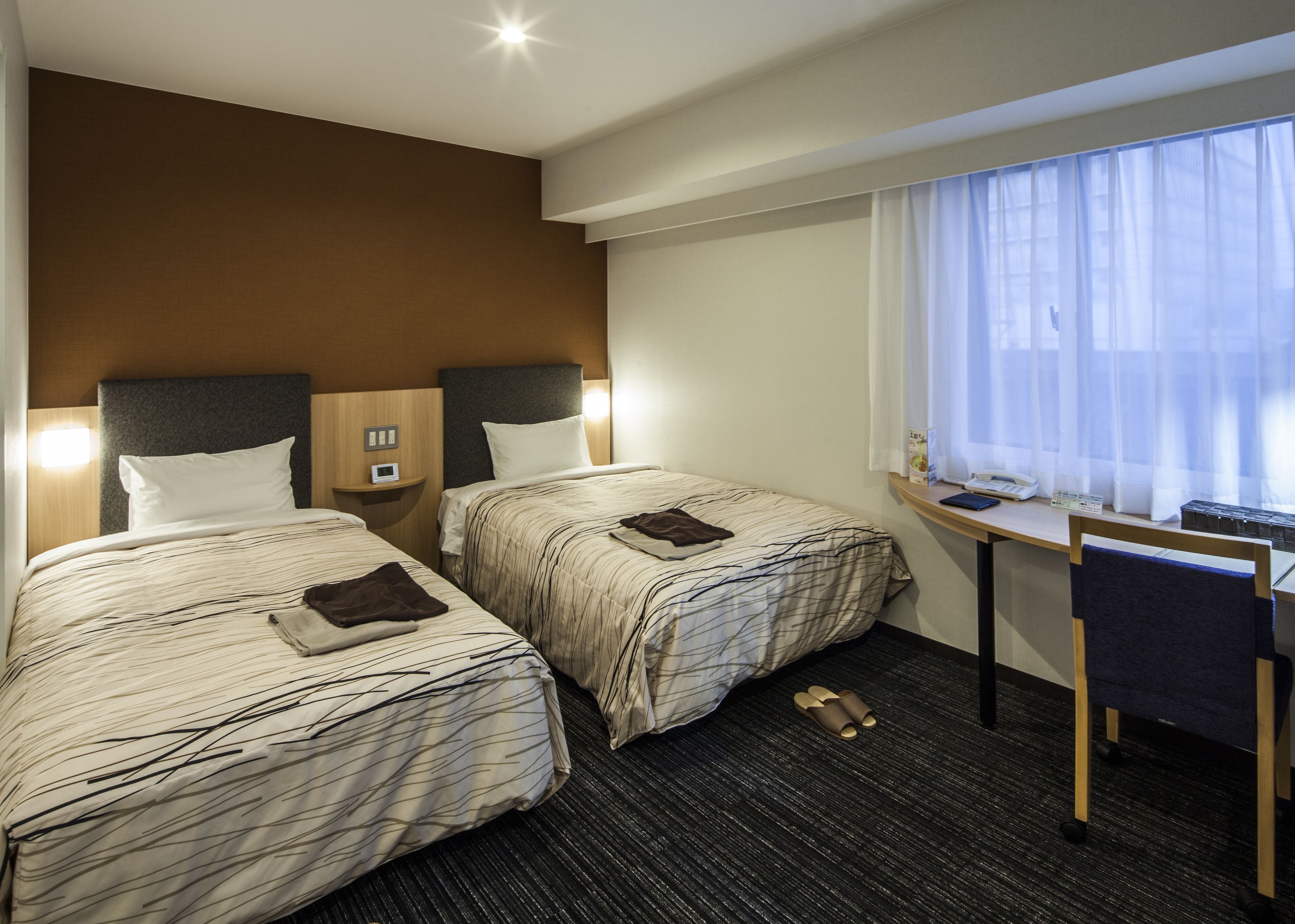 premium bedding, desk, blackout curtains, free wifi