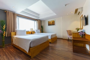 Habitación ejecutiva con 1 cama matrimonial o 2 individuales | Minibar, caja de seguridad en la habitación, escritorio y wifi gratis