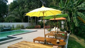 Outdoor pool, pool umbrellas, pool loungers