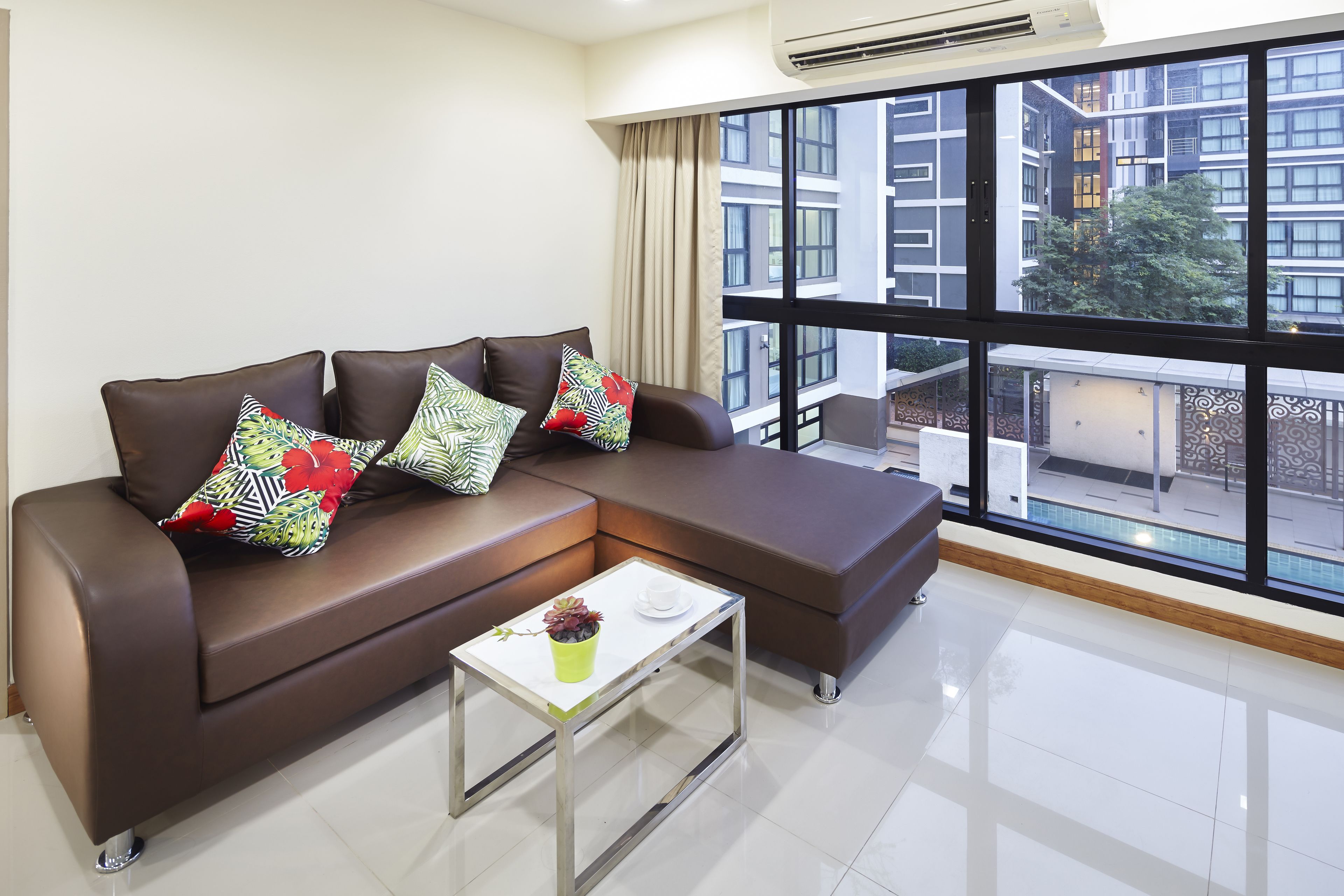 suite, 2 bedrooms | living area | flat-screen tv