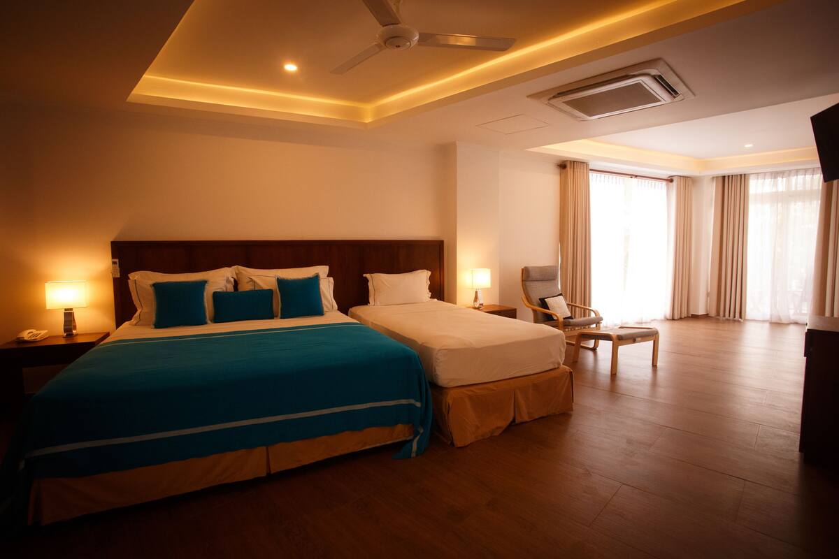 Premium Room Ocean View | Ropa de cama de alta calidad y minibar