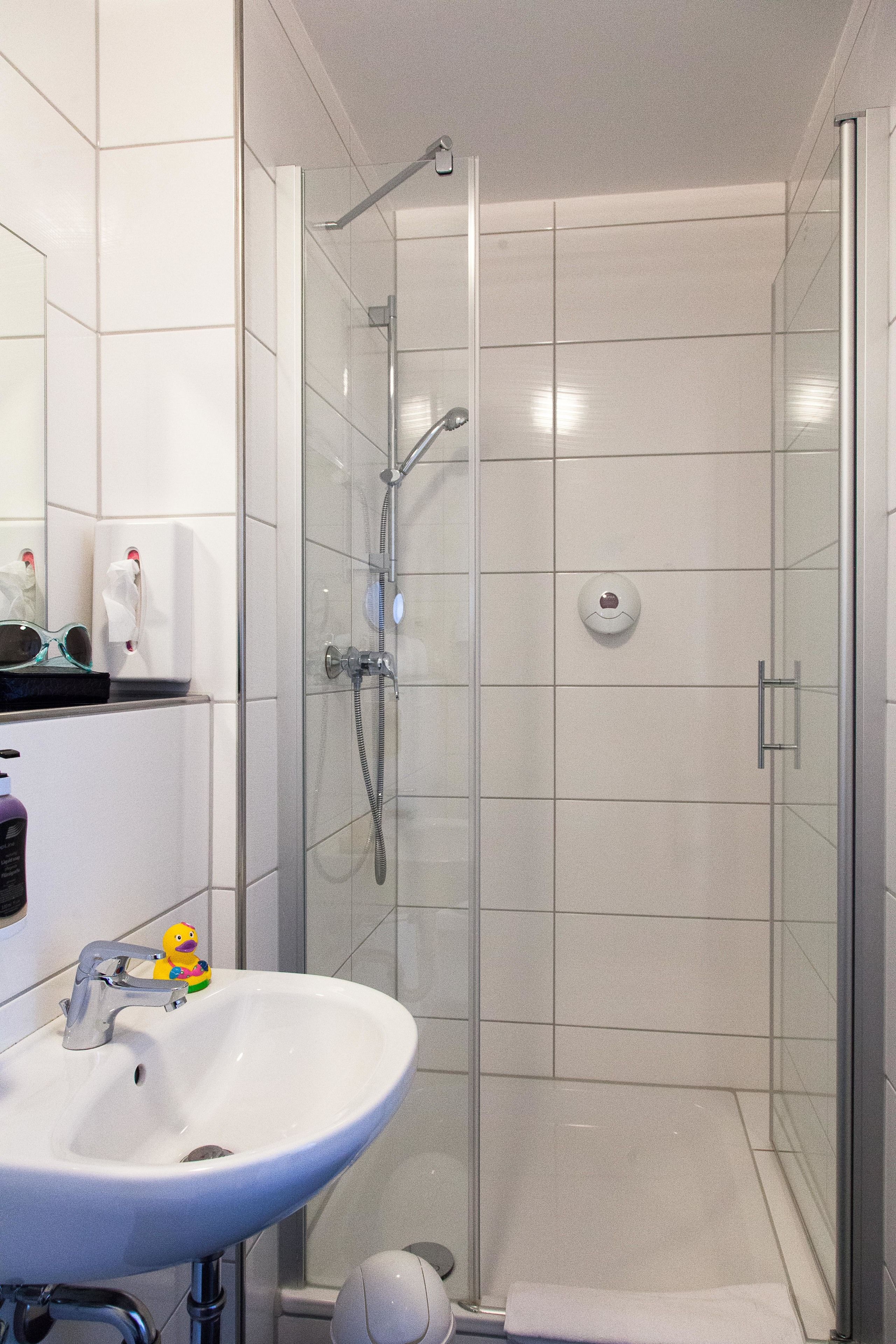 standard single room | bathroom | shower, free toiletries, hair dryer, slippers