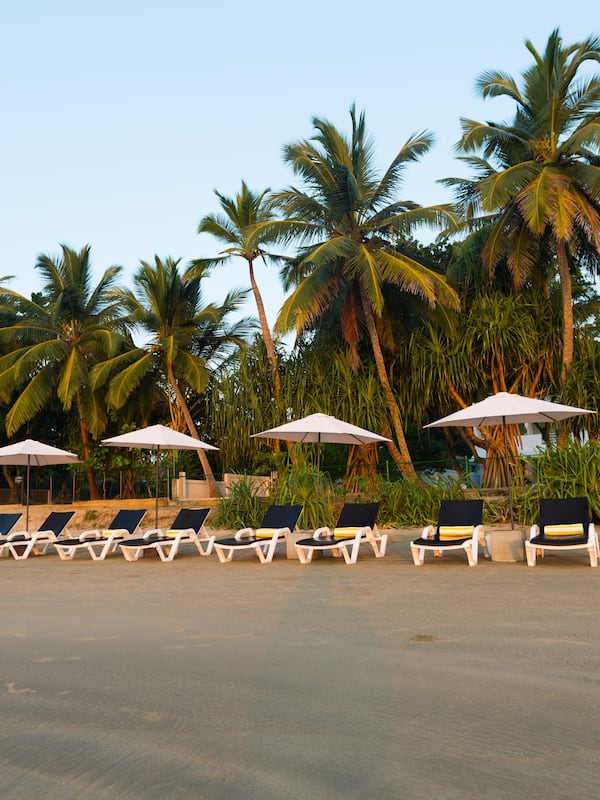 On the beach, sun loungers, beach umbrellas, beach towels