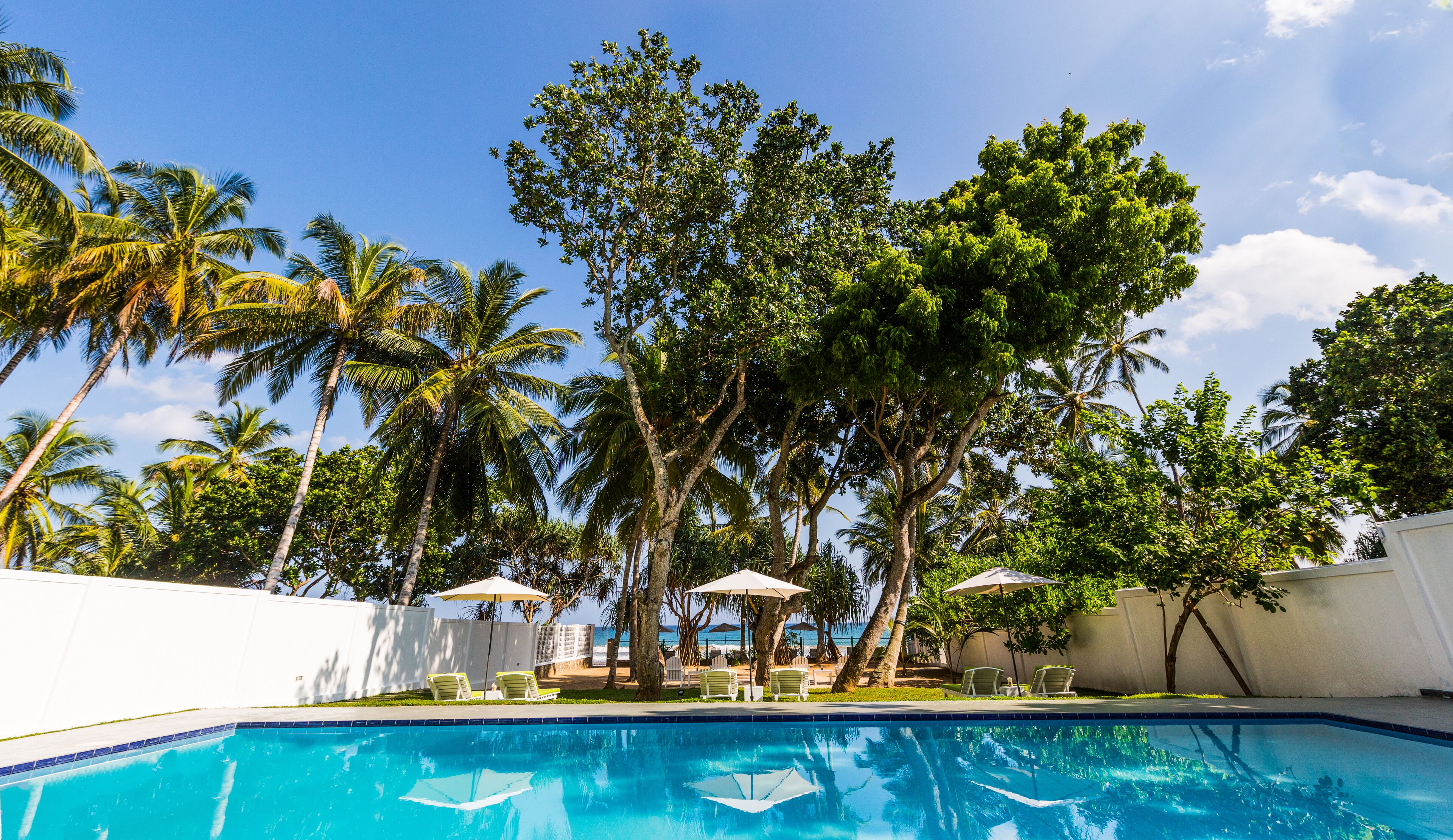 3 outdoor pools, pool umbrellas, sun loungers