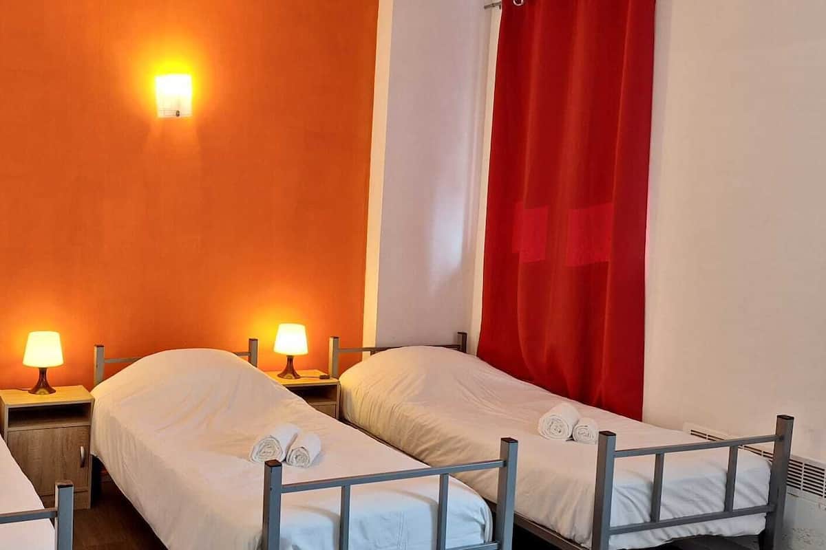Basic Triple Room | Premium bedding, desk, blackout curtains, soundproofing