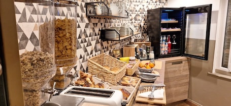 Desayuno buffet diario (EUR 9.80 por persona)