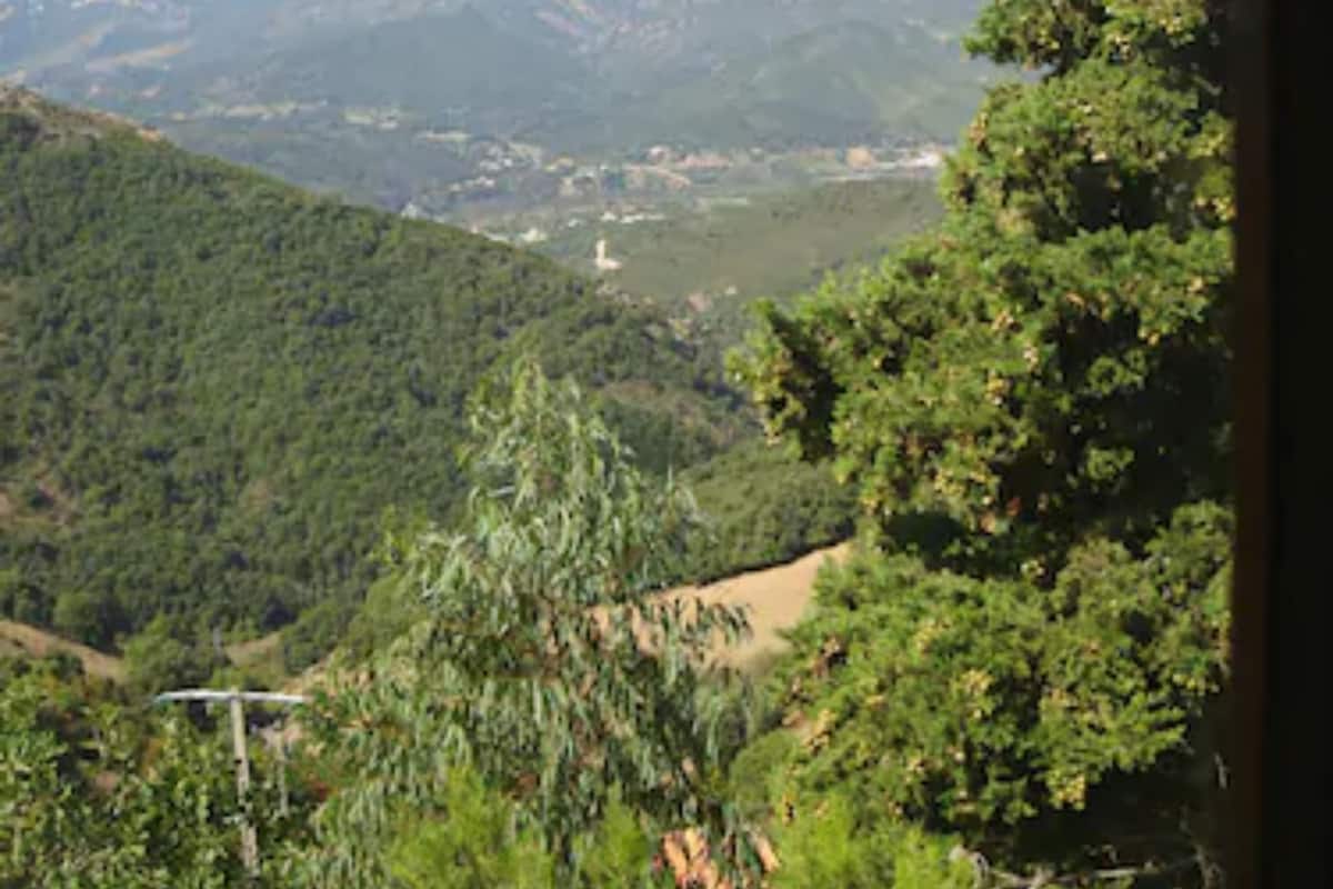 A mountainous landscape with a clear sky.