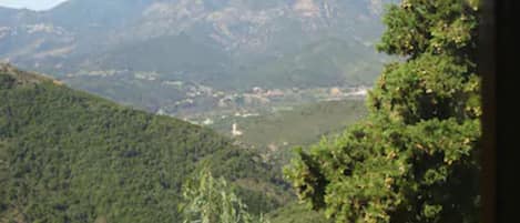 A mountainous landscape with a clear sky.