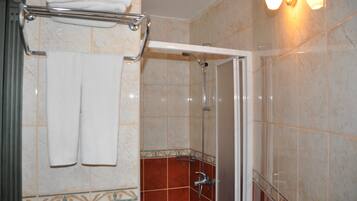 Standard Room | Bathroom | Hair dryer, towels