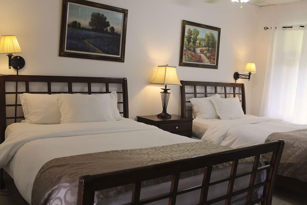 1 bedroom, pillow-top beds, individually decorated, desk