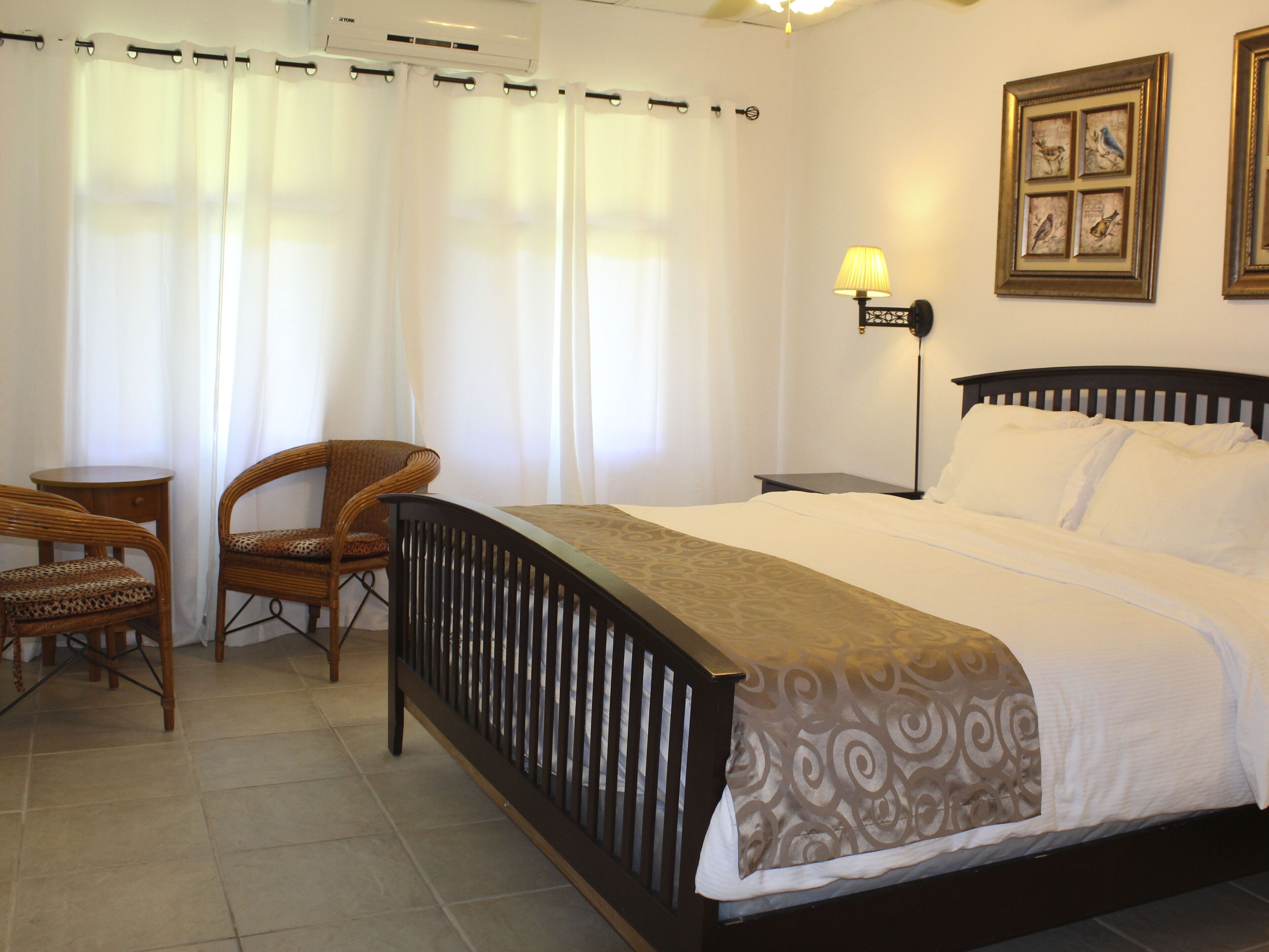 Deluxe Room, 1 King Bed, Mountain View | Pillow-top beds, individually decorated, desk, free WiFi