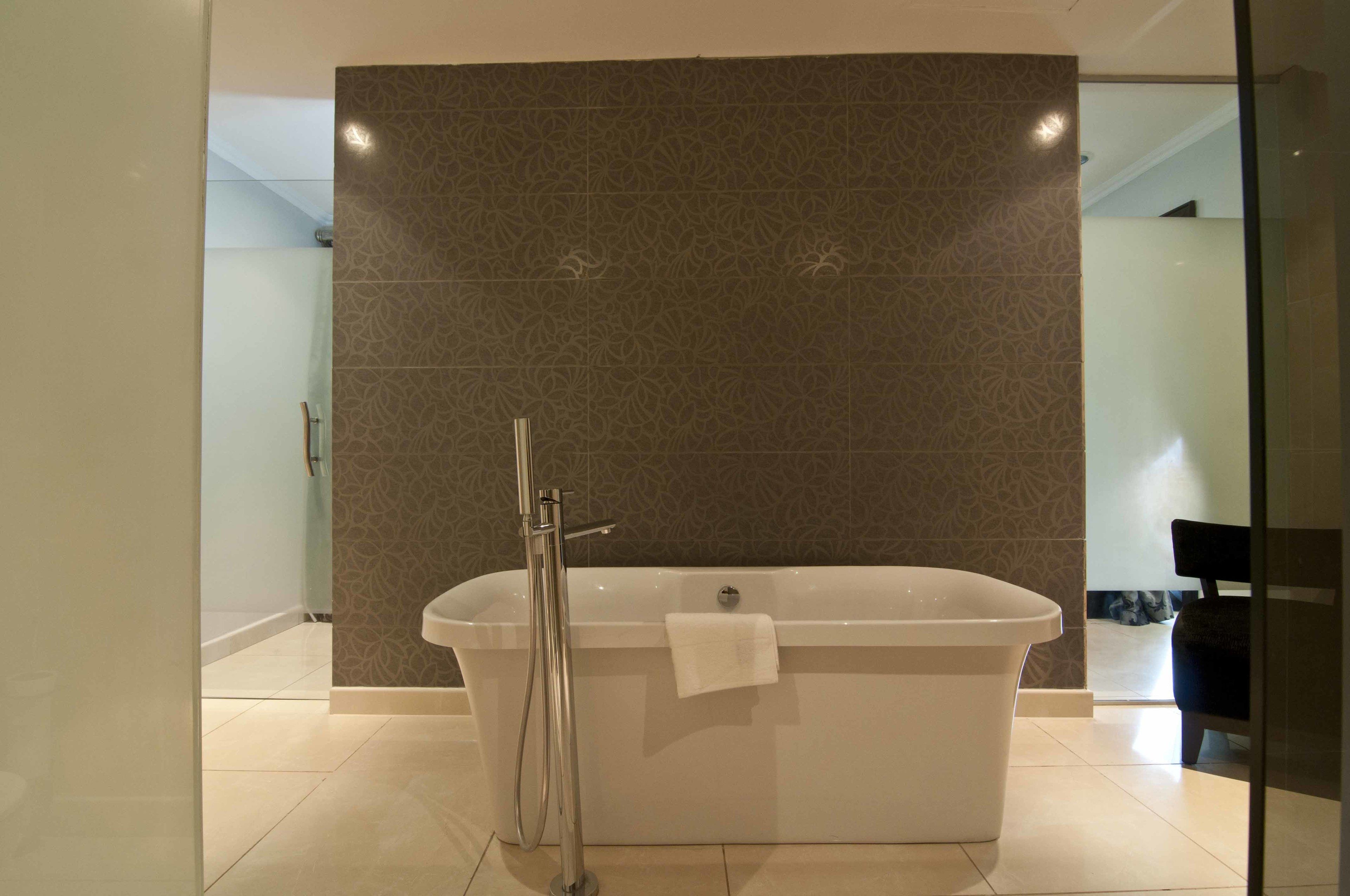 presidential penthouse, kitchenette | bathroom shower