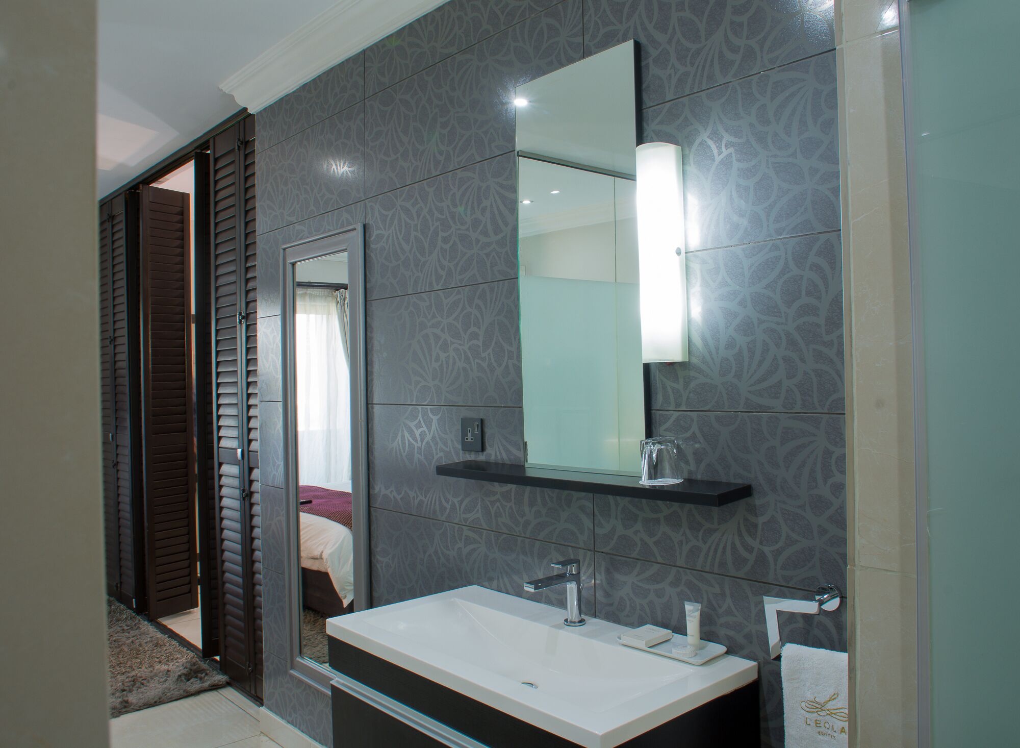 elite suite, 1 king bed | bathroom | free toiletries, hair dryer, bathrobes, slippers
