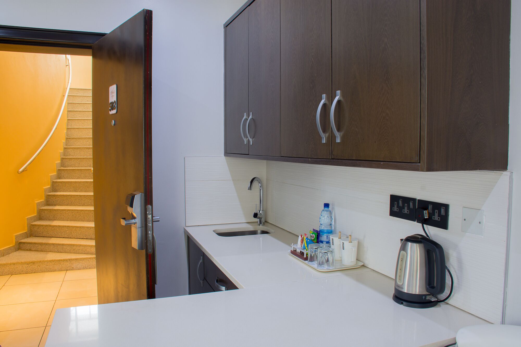 elite suite, 1 king bed | private kitchen | mini-fridge, microwave, coffee/tea maker