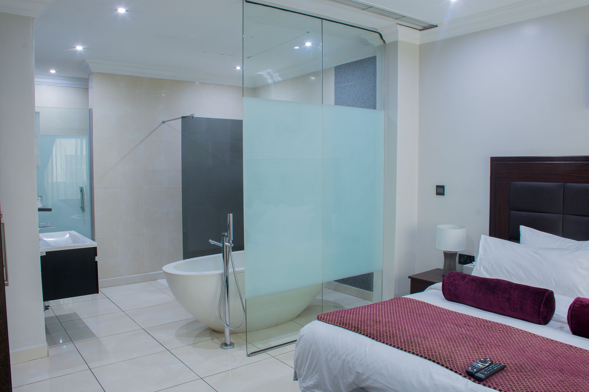 elite suite, 1 king bed | bathroom | free toiletries, hair dryer, bathrobes, slippers