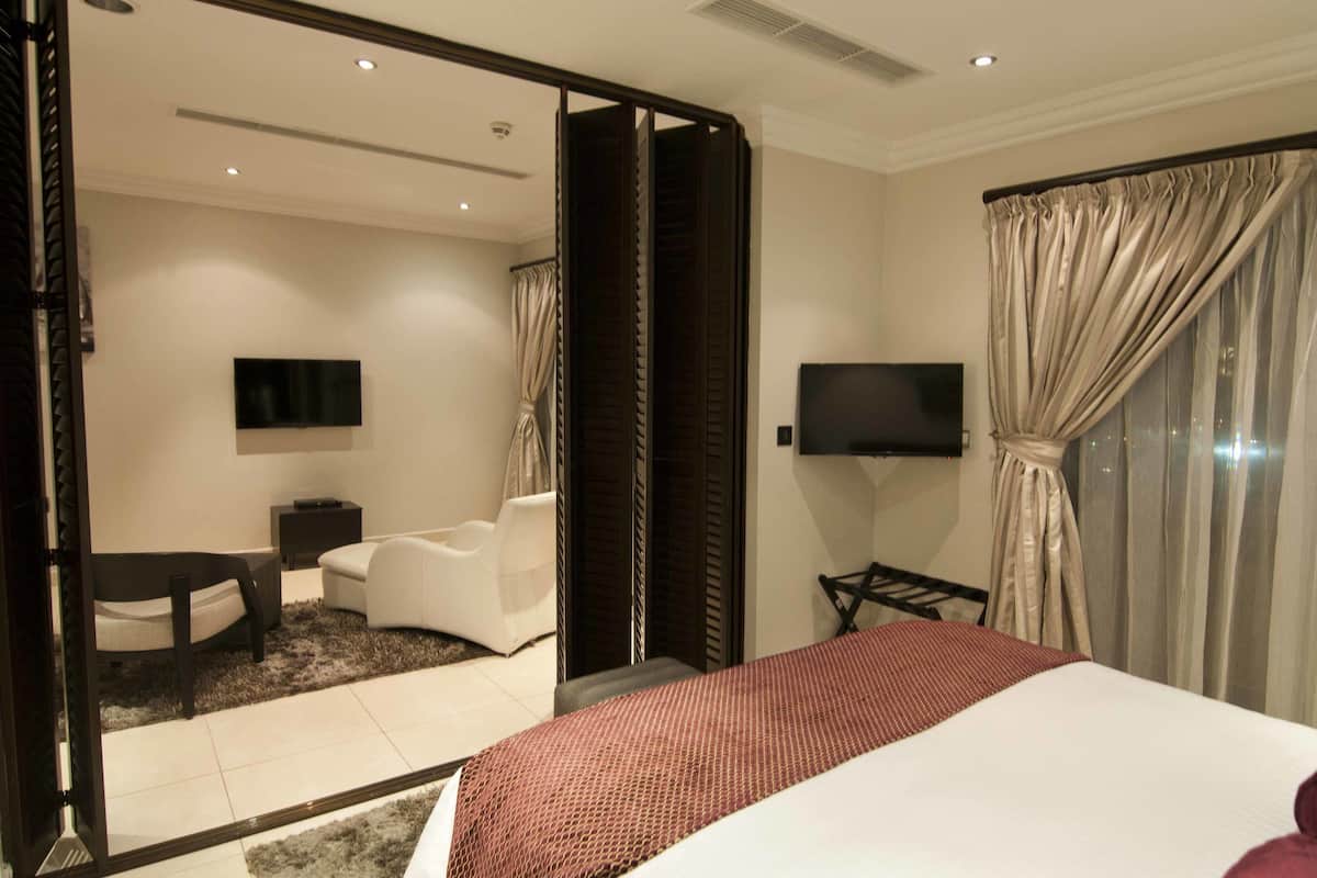Suite Executive, angolo cottura, al piano executive | 1 camera, biancheria da letto di alta qualità, una cassaforte in camera