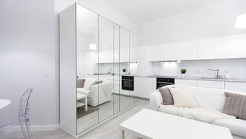 Design Apartment, 1 Bedroom | Living area | Flat-screen TV