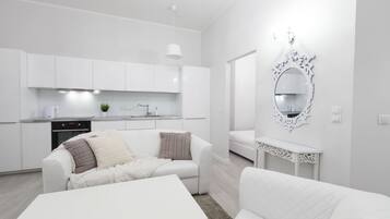 Design Apartment, 1 Bedroom | Living area | Flat-screen TV