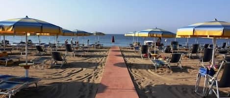 Private beach, sun loungers, beach umbrellas, beach volleyball