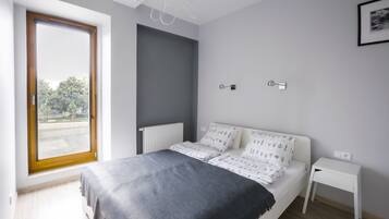 Superior Suite, 1 Bedroom | Desk, iron/ironing board, free WiFi, bed sheets