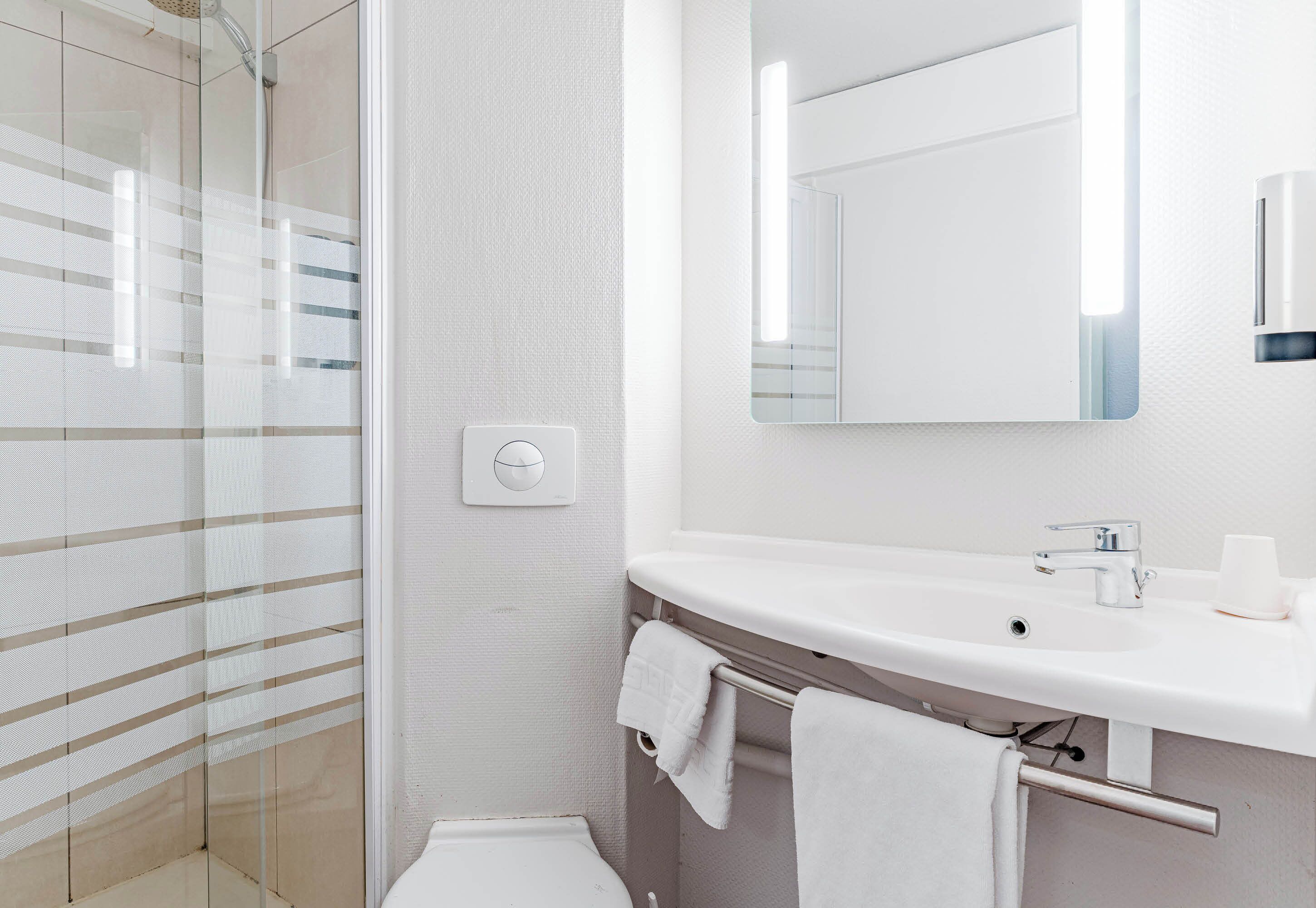 shower, free toiletries, towels