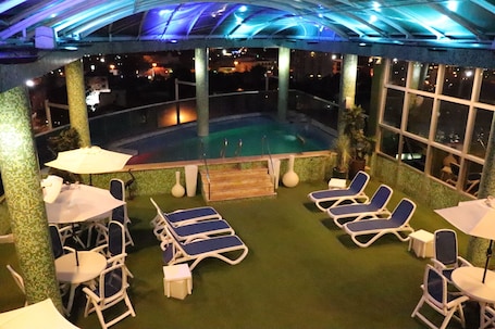 Outdoor pool, open 8 AM to 9 PM, sun loungers