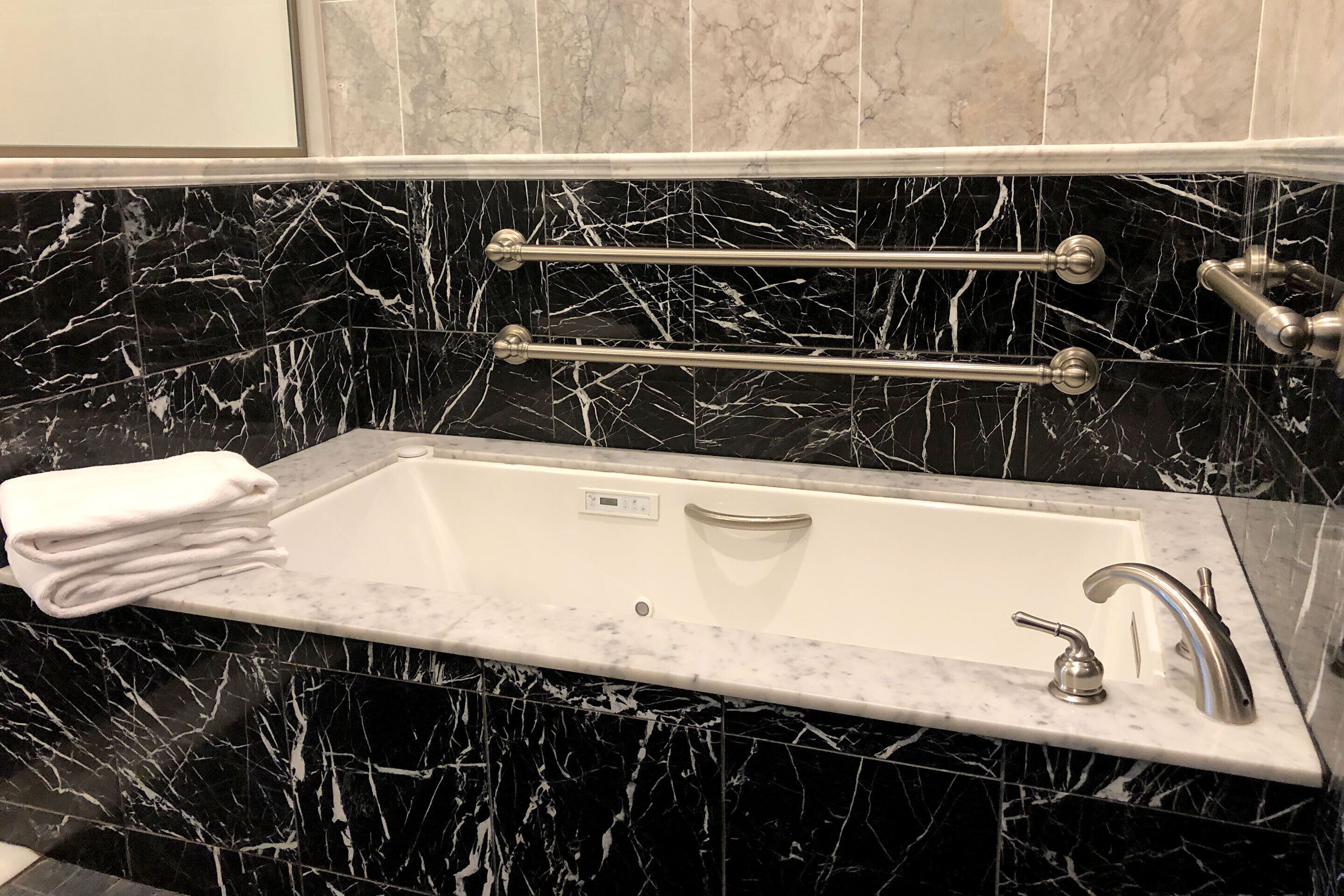 deluxe king ada | bathroom | separate bathtub and shower, deep-soaking bathtub, free toiletries
