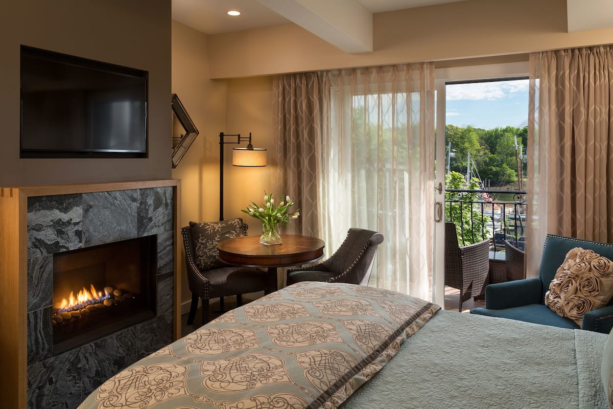 ocean view king | living area | flat-screen tv, fireplace