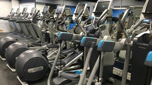 A row of treadmills and elliptical machines in a gym. - The Inn at Montrose (Montrose)