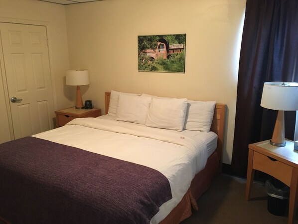 Standard Suite, 1 Bedroom | Blackout drapes, iron/ironing board, free WiFi, bed sheets