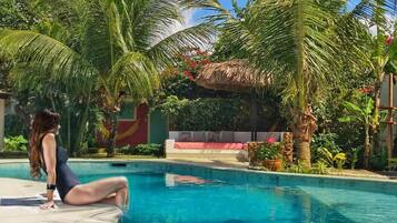 Outdoor pool, open 6:00 AM to 10:00 PM, sun loungers